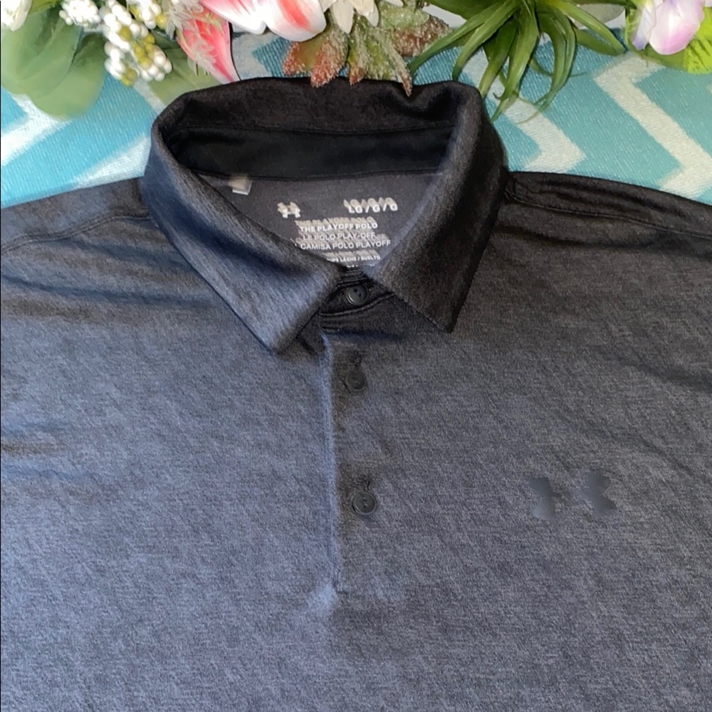Under Armour Black Performance Polo Shirt. In new condition.